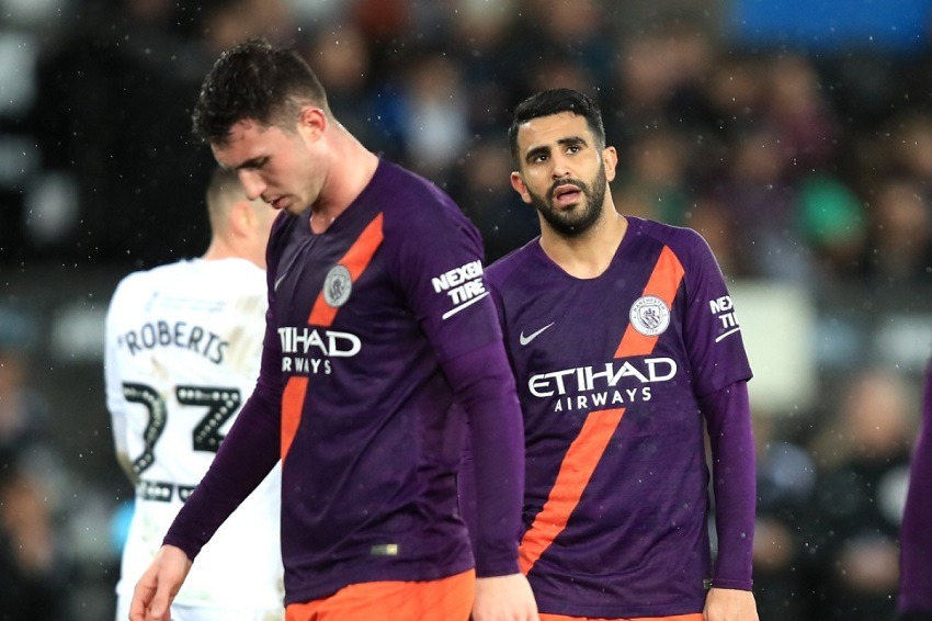 Mahrez y Laporte