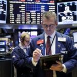 El Dow Jones baja un 0,25 , pero el S&P 500 y el Nasdaq cierran con nuevos récords