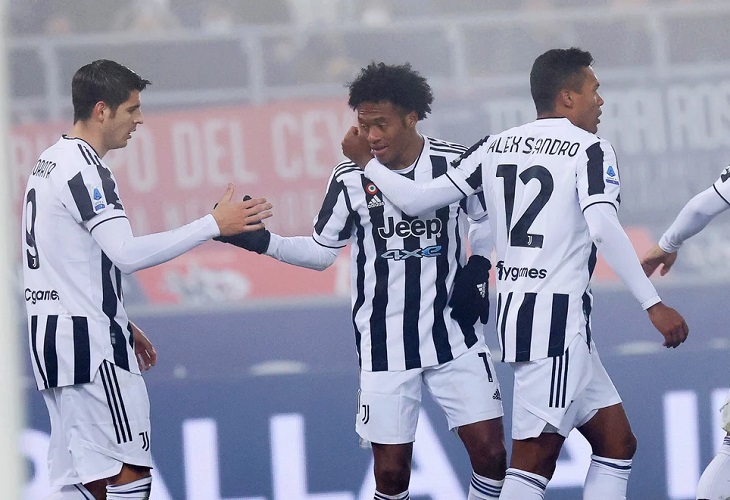 Morata y Cuadrado guían al Juventus en la niebla de Bolonia