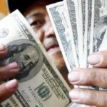 Un nuevo impuesto a las divisas en Venezuela pone en apuros al comercio