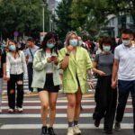 China informa de 427 nuevos casos de covid, 360 por contagio local