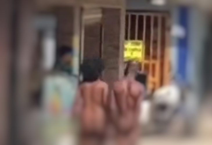 Graban en Cali a pareja caminando sin ropa por el barrio Comuneros