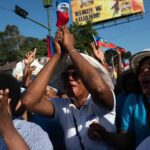 Miles de haitianos marcharon para implorar la ayuda divina ante la crisis