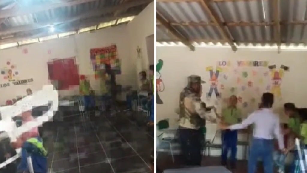 Integrantes del frente 36 de las farc jugando con niños en escuela de Yarumal