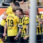 Doblete de Haller le da triunfo y liderato al Dortmund