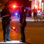 Nueve heridos por tiroteo entre 2 grupos en un paseo playero en Florida