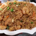 Sorprende a tu familia con esta receta de arroz chino que parece de chef